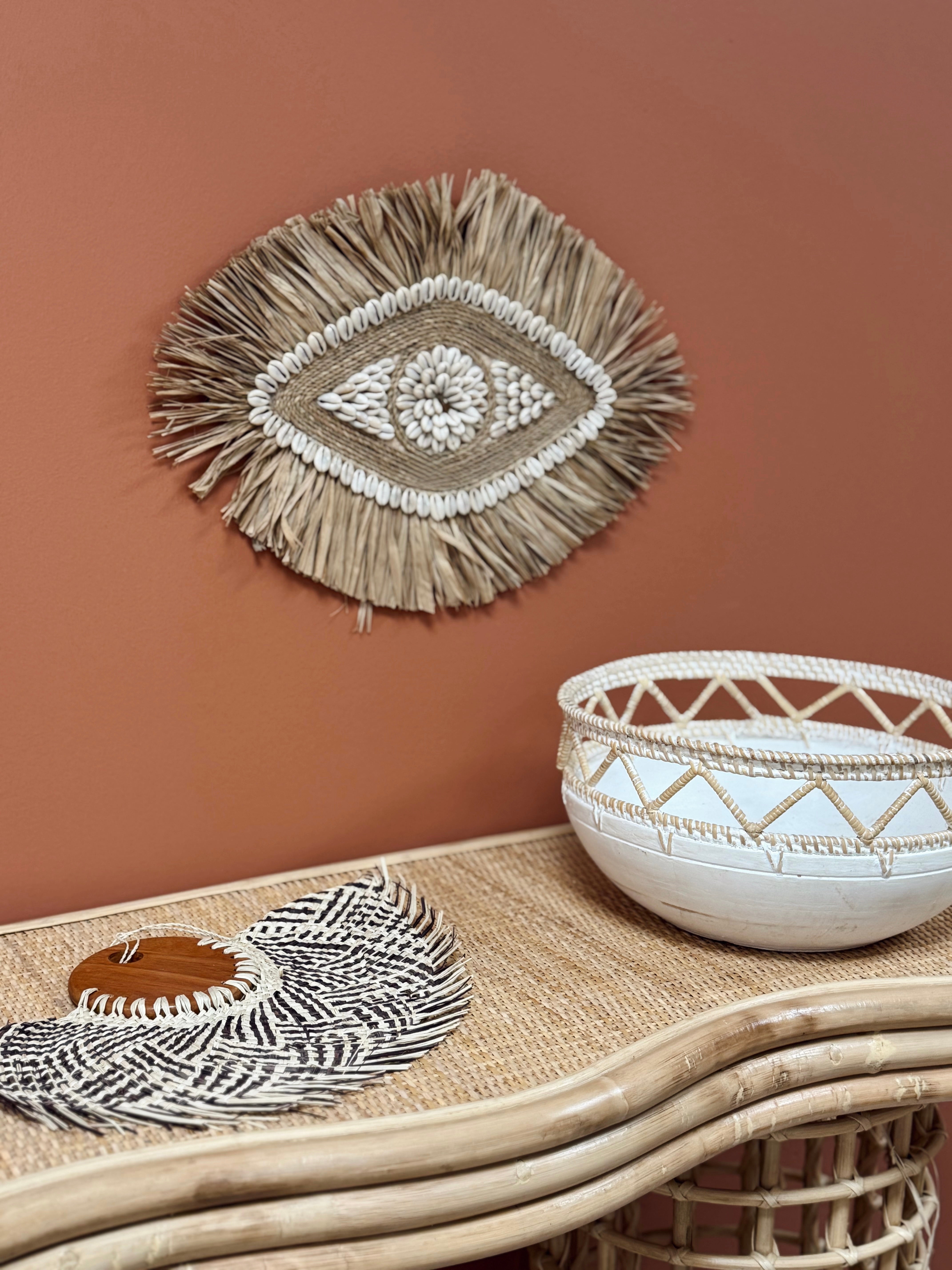 Décoration murale œil en coquillages