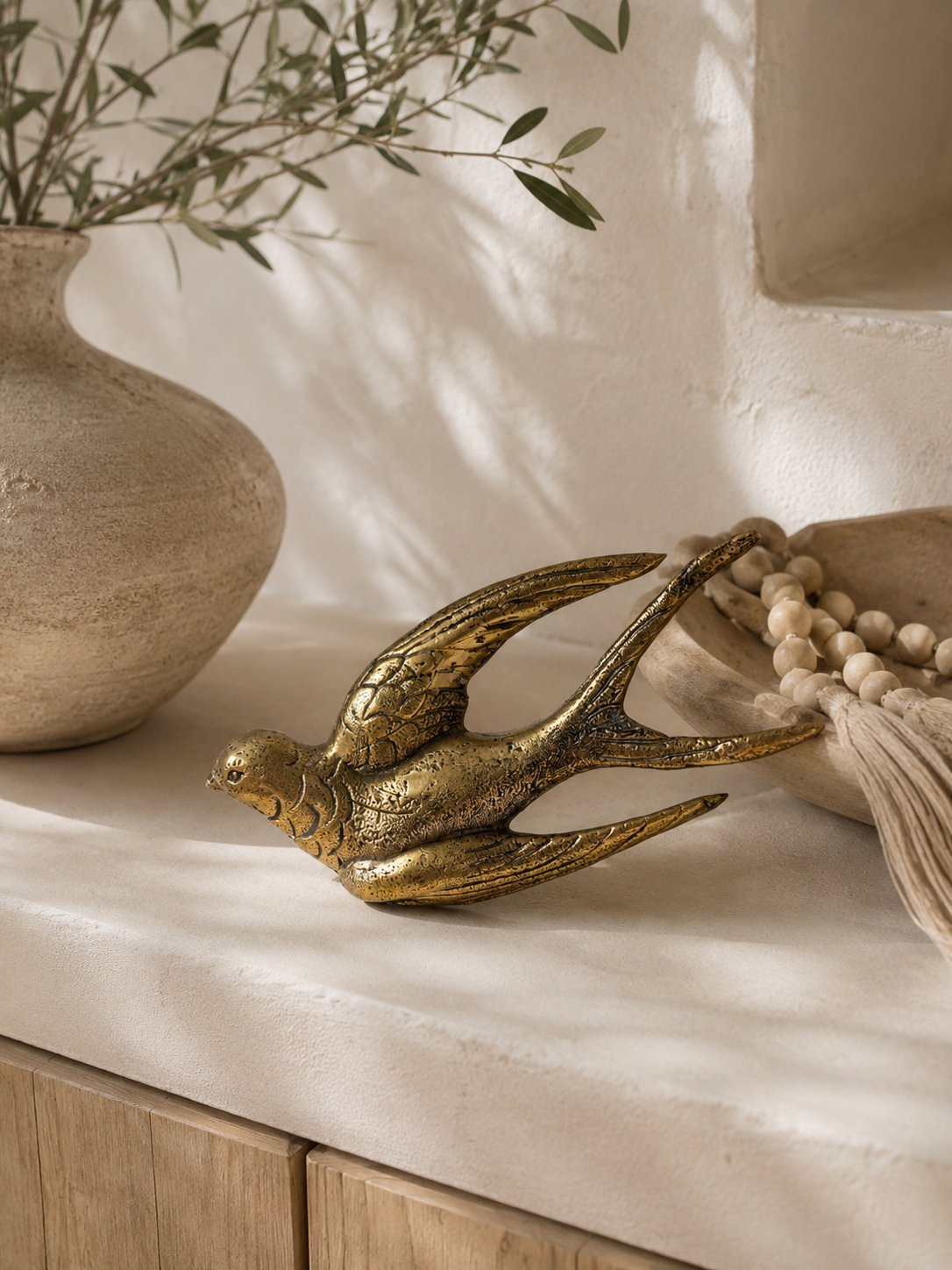 Hirondelle décorative en laiton
