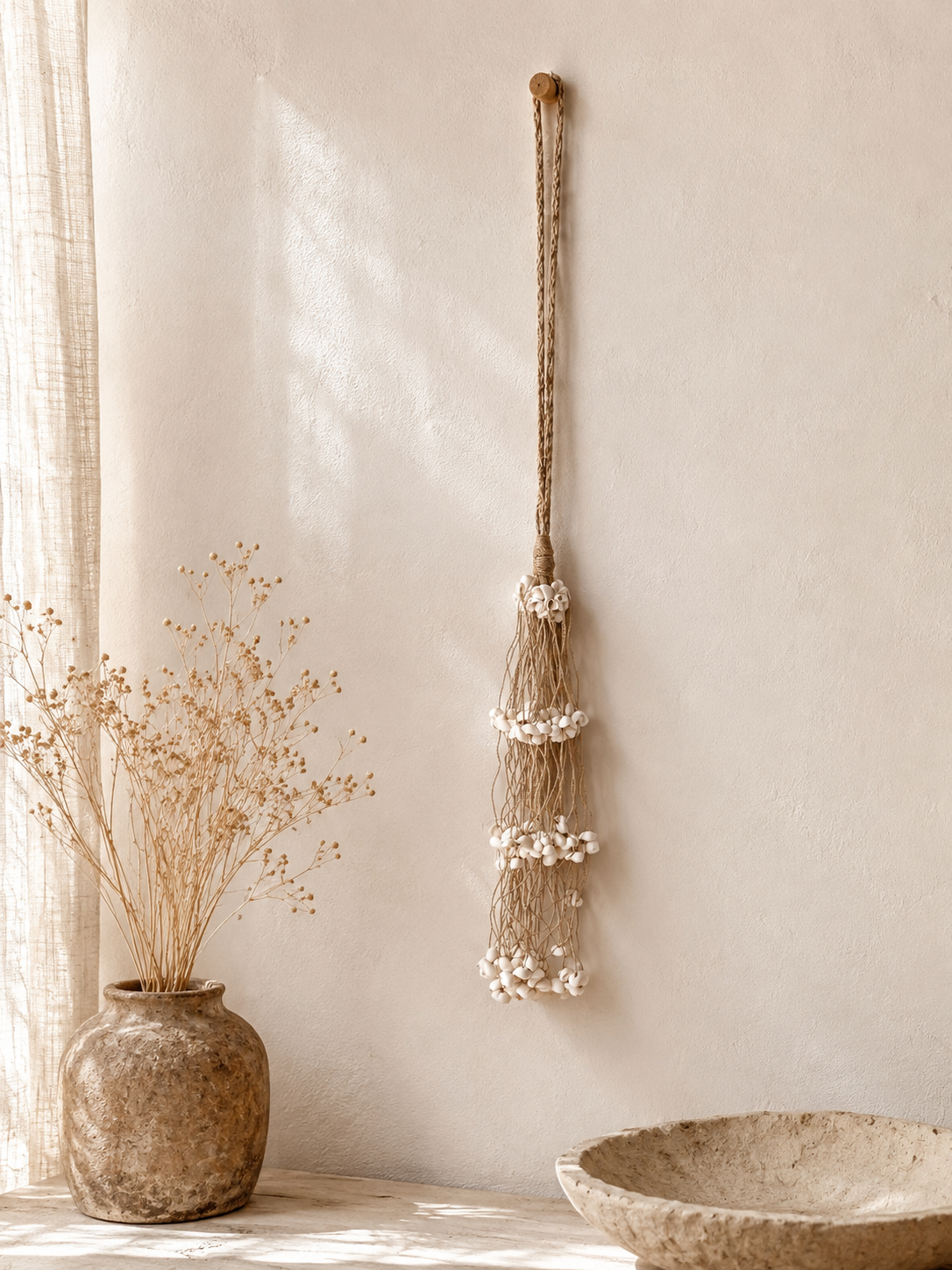Suspension murale en coquillage